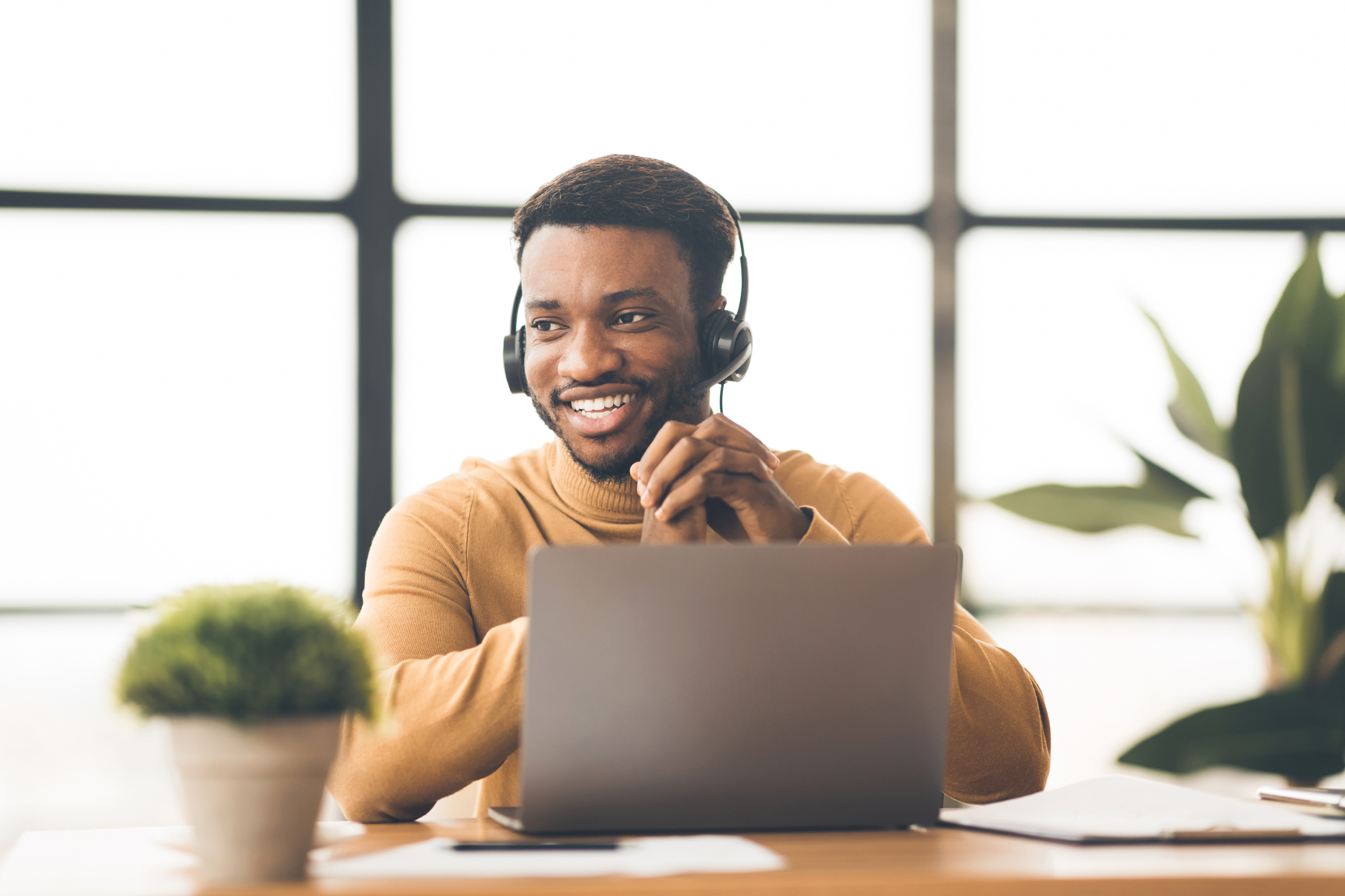 Man on a call at laptop